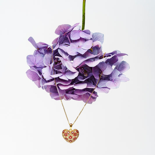 Silver necklace with enameled heart