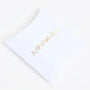 White pillow box packaging with gold embossed MINAMINA logo on a white background