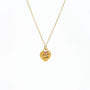Gold heart pendant necklace with engraved text "Sorelle scelte" and two small star charms