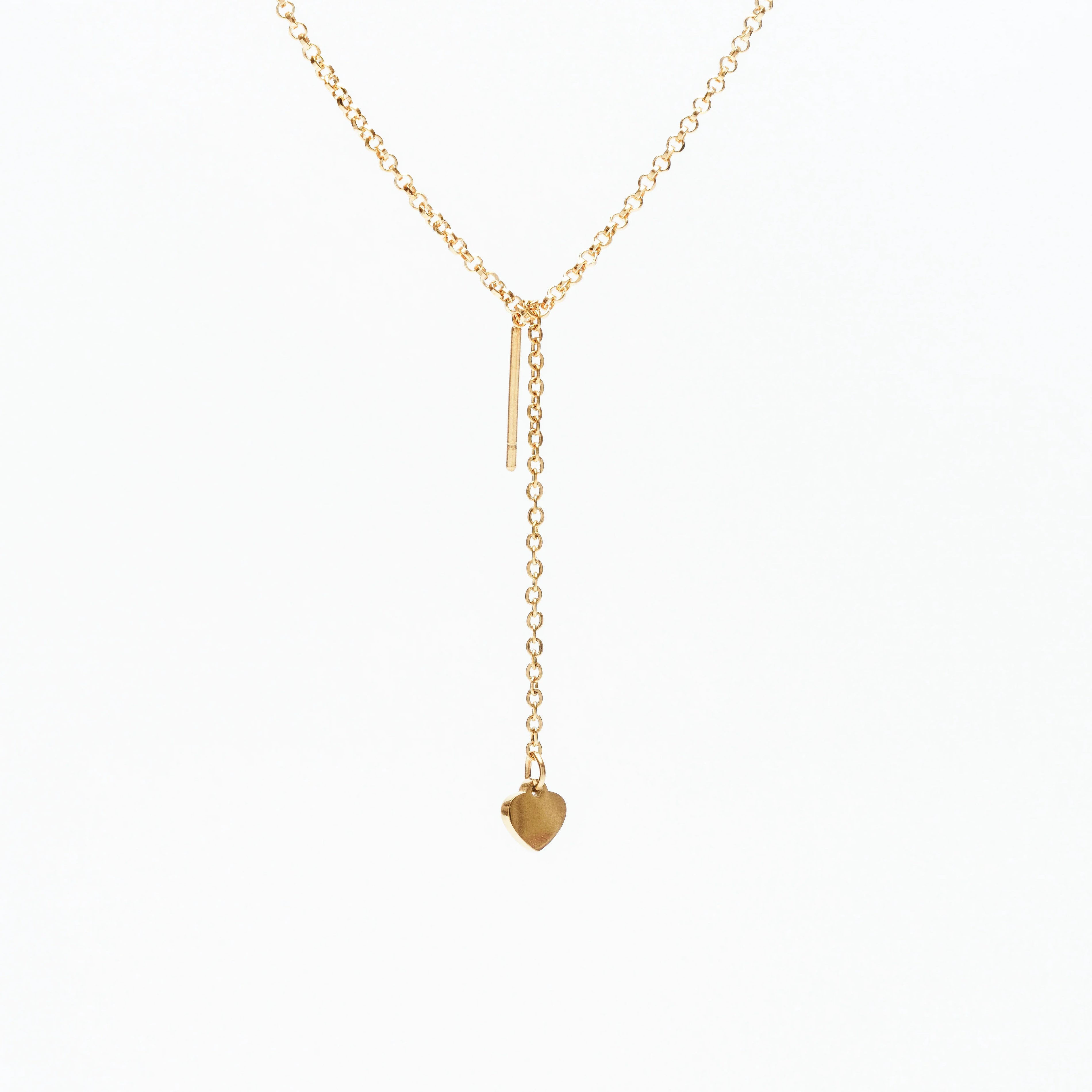 Elegant gold chain necklace with dangling bar and heart charm on white background