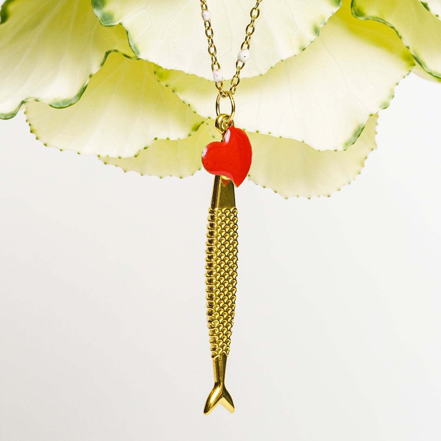 Fish and heart pendant necklace